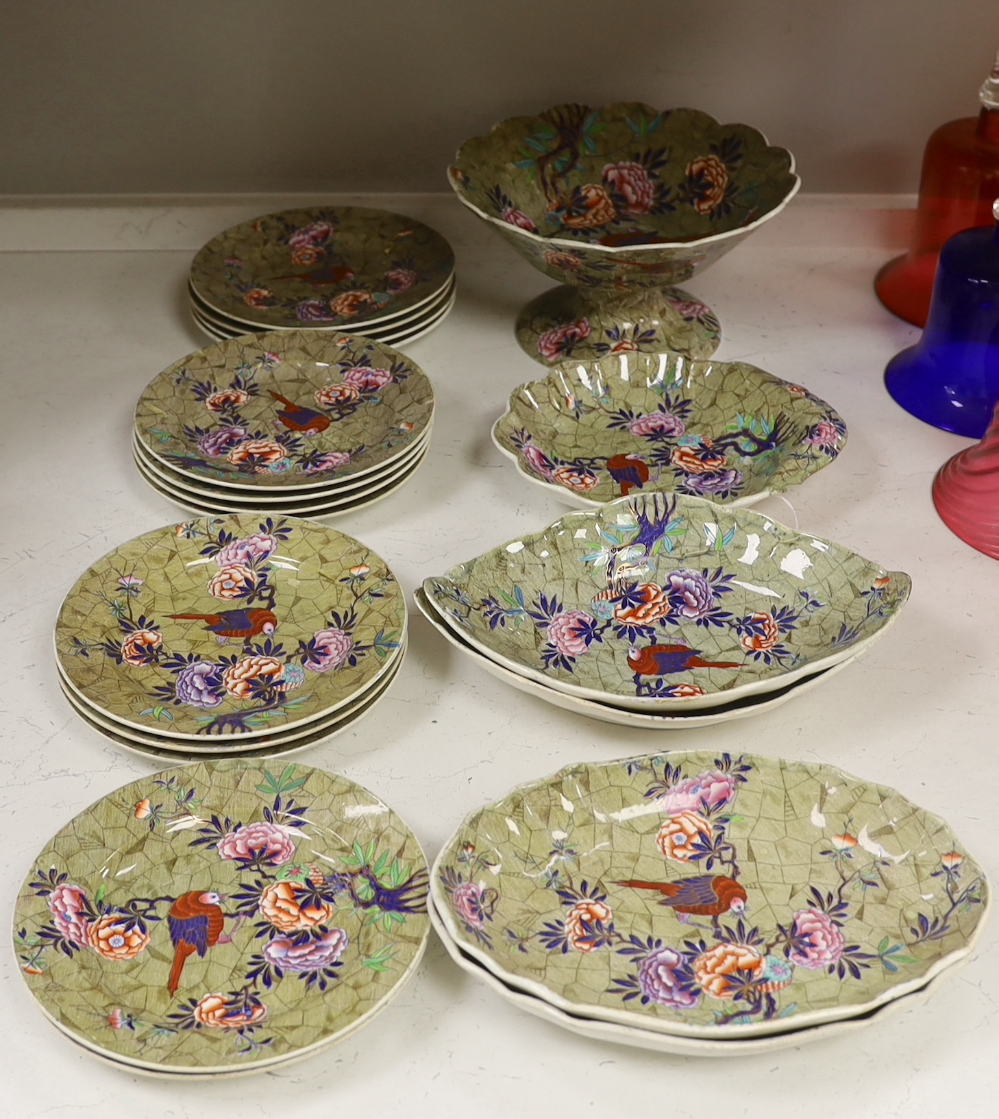 A Spode ‘Tumbledown Dick’ part dessert service, early 19th century, decorated with birds and flowers
